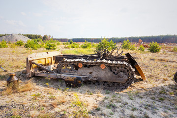 Radioactive dead zone of Chernobyl. Abandoned looted appliances, cars, electronics in Chernobyl accident. Consequences of evacuation, looting, vandalism after an explosion