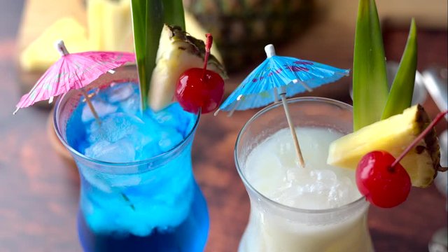 Summer cocktail image, pina colada and blue hawaii