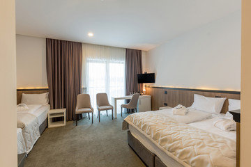 Naklejka na ściany i meble Interior of a hotel bedroom