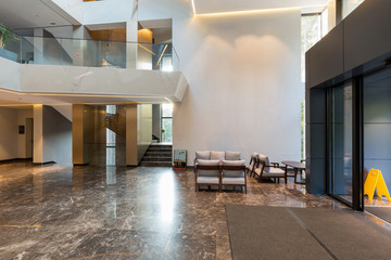 Interior of a luxury hotel lobby with marble floor