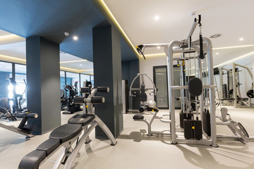 Fototapeta na wymiar Interior of a hotel gym with equipment