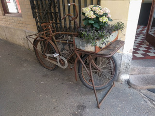 Vintage bicycle at the cafe entrance, Gothenburg, Sweden.