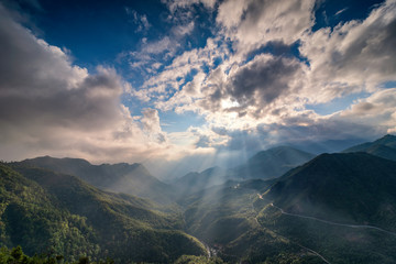 The magical sunset on O Quy Ho mountain pass before sunset. O Quy Ho Mountain Pass (Sapa, Vietnam) is Vietnam's longest mountain pass.