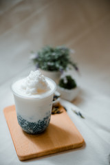 coconut frappe with sago on plastic glass