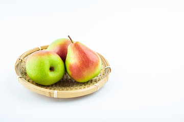 Fresh red crispy pears on white background