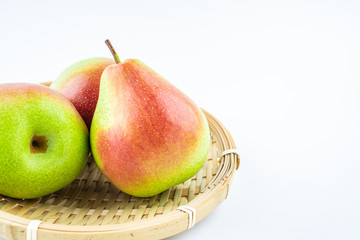 Fresh red crispy pears on white background