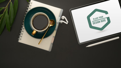 Workplace with mock up tablet, coffee cup, notebook, accessories and leaf decorated on black table