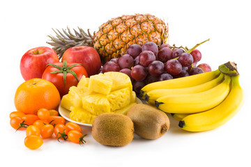 Naklejka na ściany i meble Close-up variety of fresh fruits on the bright table