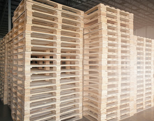 Wooden pallets in stock warehouse. material for industrial cargo freight transport.