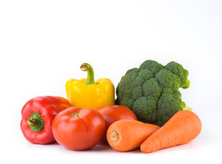 Close-up variety of fresh vegetables on white background