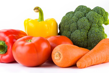 Variety of fresh vegetables on white background