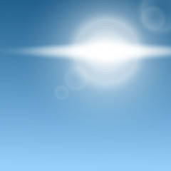 Sunshine on blue sky - realistic white lens flare from bright sun light