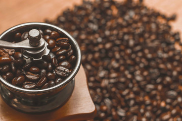 Close up coffee beans in coffee grinder