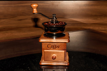 Close up coffee beans in coffee grinder