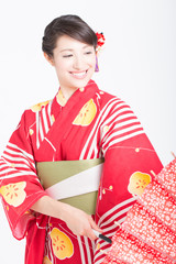 番傘と浴衣姿の女性