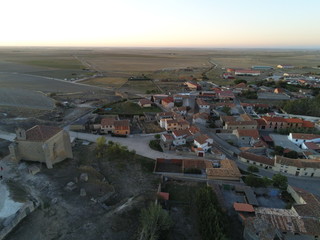 Obraz premium Ampudia, village with castle in Palencia,Spain. Aerial Drone Photo