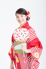 団扇と浴衣姿の女性