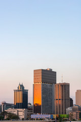 Vertical image of Brisbane city skylines during sunset time