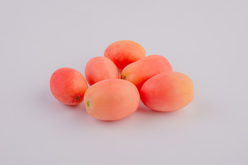 Fresh red Seeda tomatoes on white background, Thai tomatoes