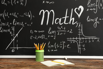 Stationery on desk in classroom