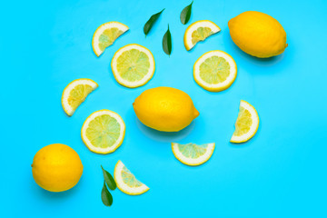 Fresh lemons on color background