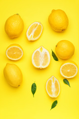 Fresh lemons on color background