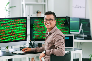 Portrait of male programmer in office
