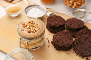 Preparing of delicious cupcake in jar