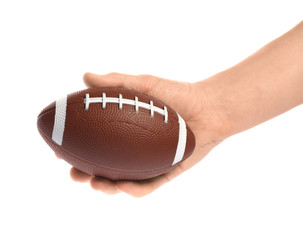 Male hand with rugby ball on white background