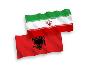 Flags of Albania and Iran on a white background