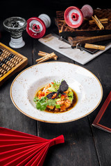 Tartare with red fish and greens in a sauce