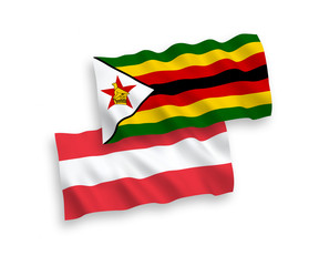 Flags of Austria and Zimbabwe on a white background