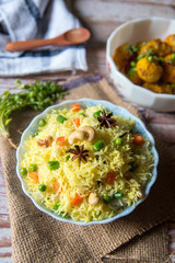 Indian style cooked rice or pulao with vegetables and spices