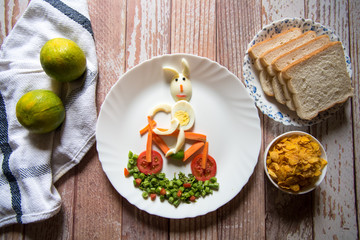 Shape of a rabbit prepared with food ingredients along with breakfast menu