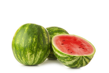 Fresh watermelon and slice isolated on white background.