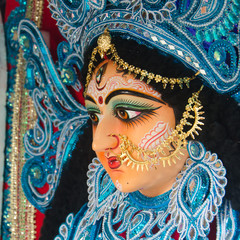 Close up of Hindu Goddess Durga idol fully ornamented