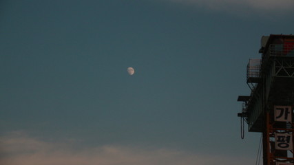 Fototapeta na wymiar Moon in the early sky