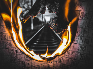 burning paper with a fire