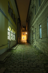 Fototapeta na wymiar Old narrow street in Kamnik by night