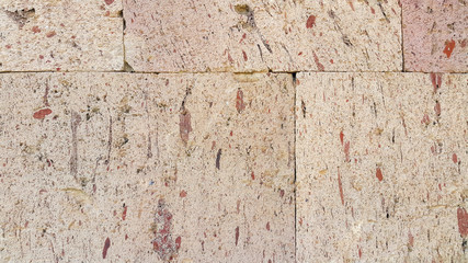 Brown and orange tuff wall