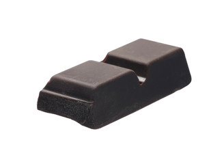 Piece of delicious dark chocolate isolated on white