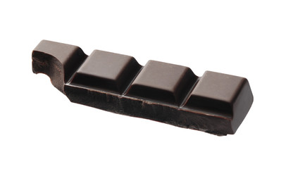 Piece of delicious dark chocolate isolated on white