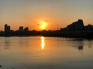 Naklejka premium sunset over the city