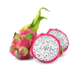 Delicious cut and whole dragon fruits (pitahaya) on white background
