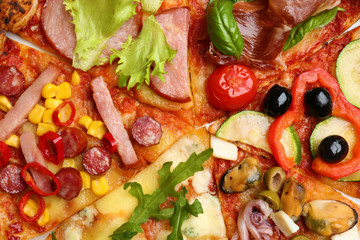 Slices of different delicious pizzas as background, closeup