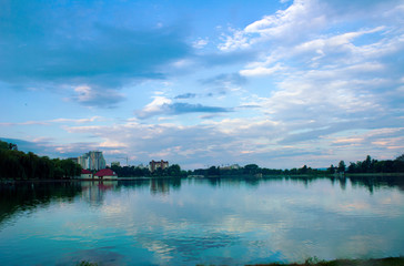morning landscape of city lake overlooking houses