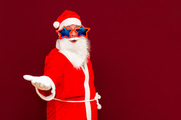 Sales, marketing,selling time! Santa is gesturing with hands like he is holding something