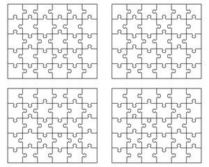Four  different white jigsaw puzzles, separate pieces	