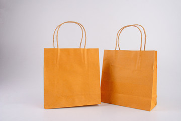 Empty recycle brown gift bag isolated on white background 