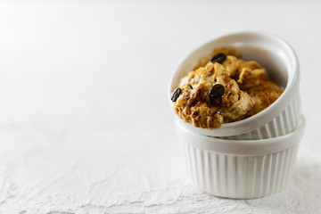 Aquafaba coffee ice cream in a white bowl. Horizontal orientation, copy space.